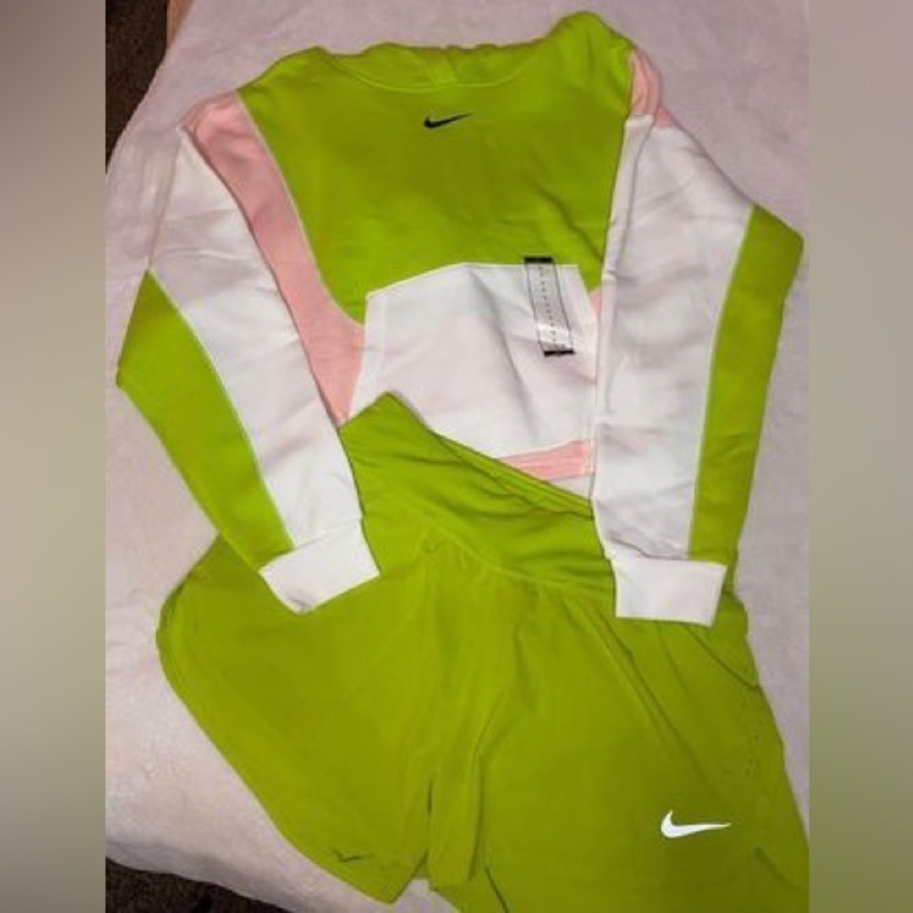 New matching Nike set size large. Cropped hoodie and running shorts
